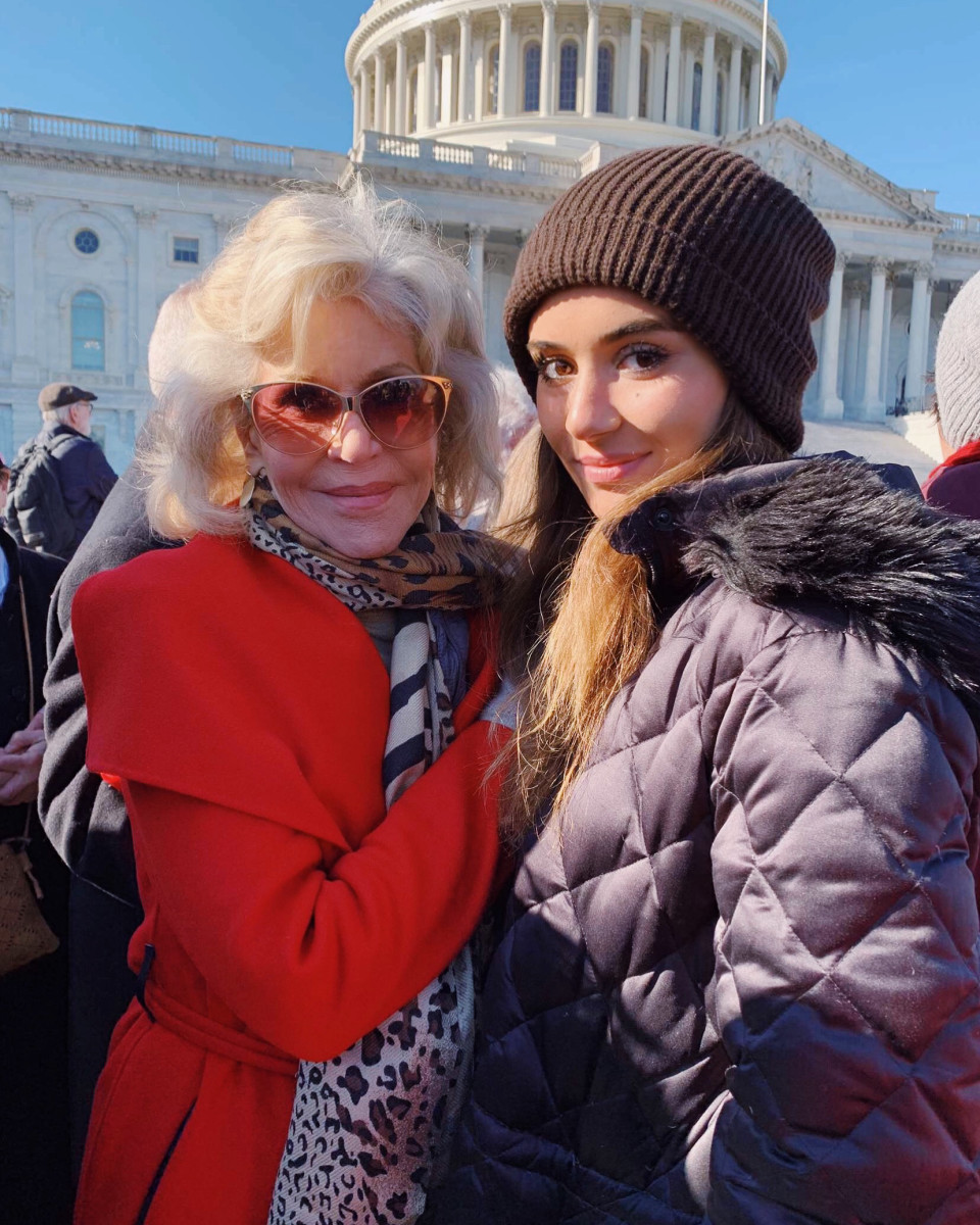 Jane Fonda and Sophia Kianni posing together at a Fridays for Future demonstration on Black Friday, which Kianni helped organize.