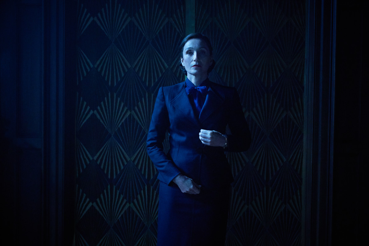 Mrs. Danvers (Kristen Scott Thomas) guards Rebecca's room.