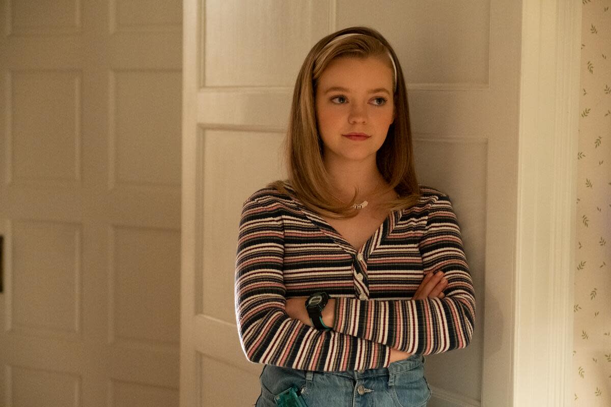 Lexie (Jade Pettyjohn) wearing her personalized charm necklace by Peggy Li.