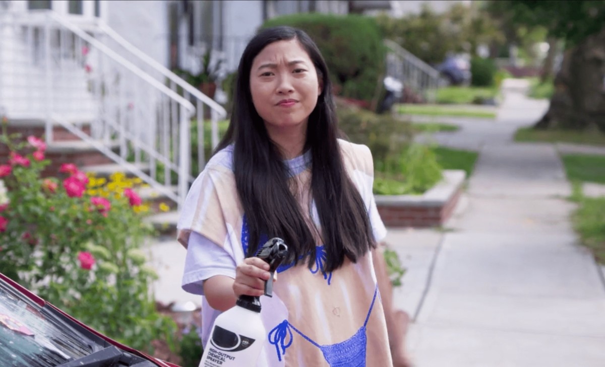 Nora (Awkwafina) blowing up that bikini car wash trope in 'Awkwafina is Nora From Queens.'