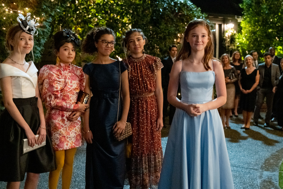 (L–R): Stacey, in a customized Tarik Ediz for top of the dress, combined with a Simons dress for the skirting, Claudia in Rotate by Birger Christensen, Mary Anne in vintage Alfred Sung, Dawn in Ulla Johnson and Kristy in customized Sherri Hill.
