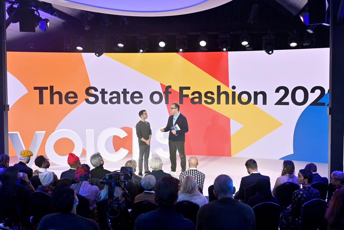 Imran Amed, founder and CEO of The Business of Fashion, and Achim Berg (R) speak on stage during BoF VOICES 2021 at Soho Farmhouse on December 02, 2021