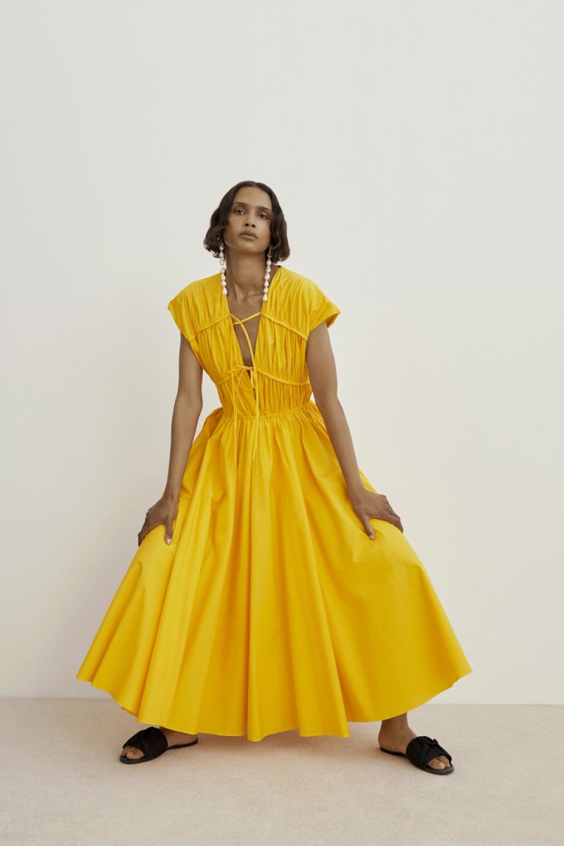 Great Outfits in Fashion History: Andie MacDowell in a Sunny Yellow Suit