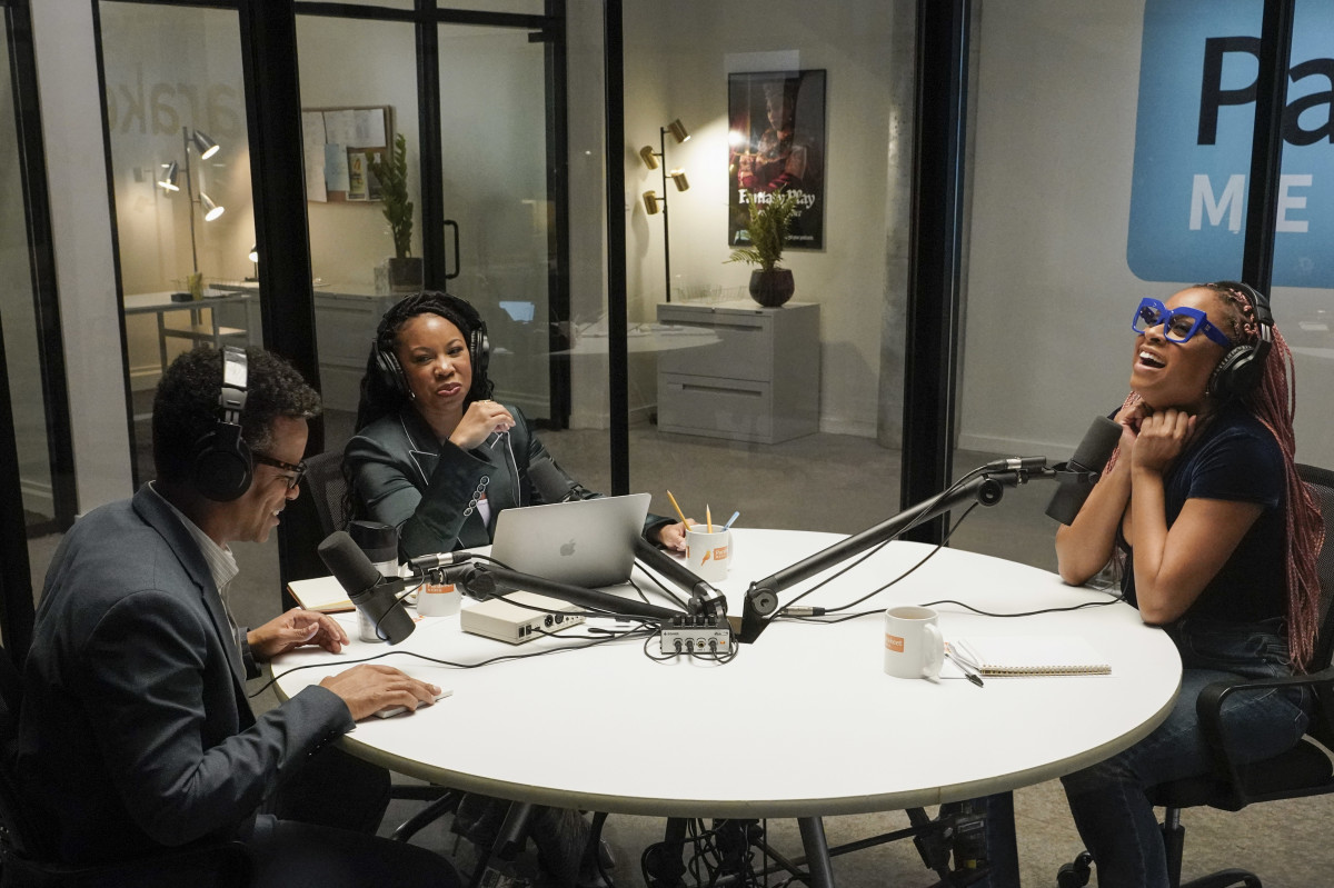 Phoebe's brother Jayden (Jordan Carlos), podcasting colleague/friend Malika and Phoebe chat in the studio.
