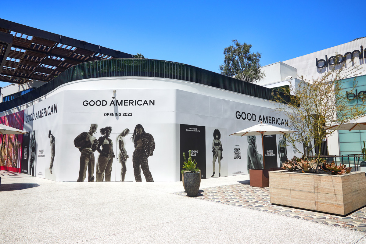 Posters wrap around a building in LA teasing at the upcoming opening of Good American's first flagship store.