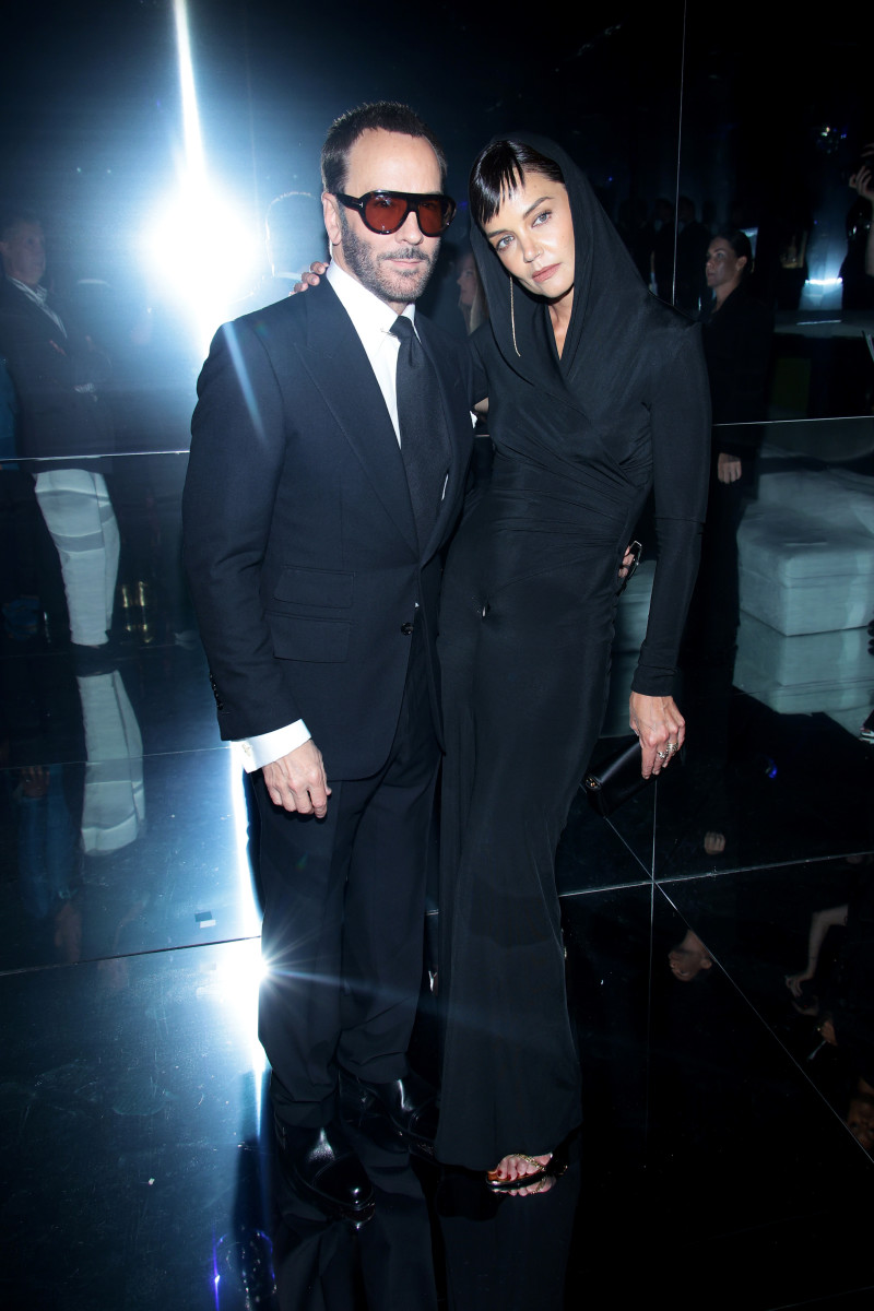 Tom Ford and Katie Holmes pose together.