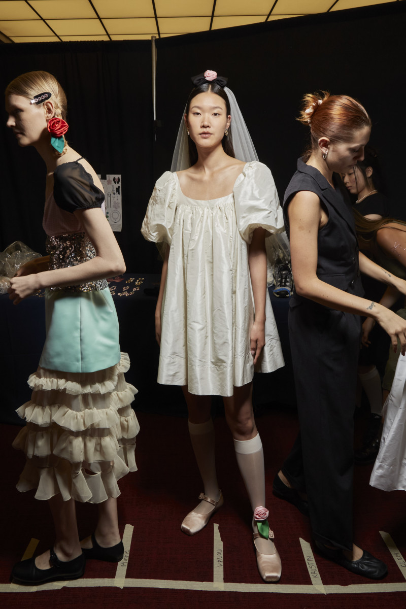 Models backstage at Sandy Liang's Spring 2023 show