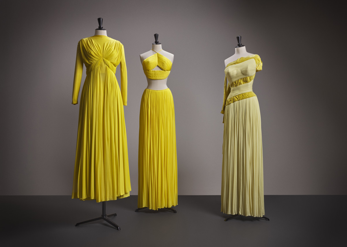 Bright and shining from the corner of the room, this trio of gowns flaunts the talent of Madame Grès across varying silhouettes.