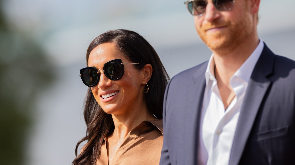 Meghan Markle Wore A Thing: Contrast J.Crew Cardigan With Staud Shorts  Edition - Fashionista