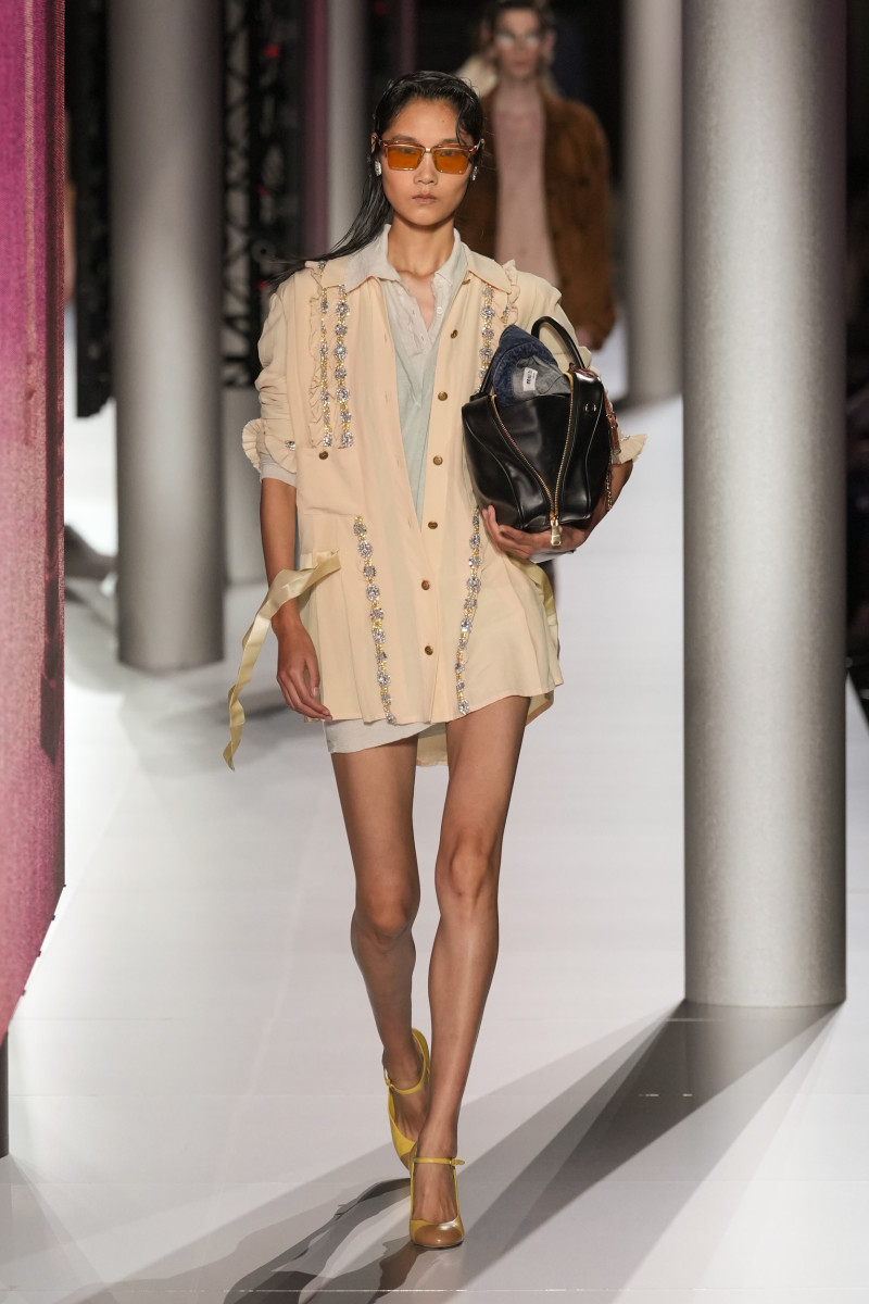 Miu Miu's Spring 2024 Models Carried Bags Stuffed With Stuff